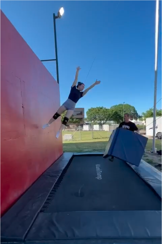 Student mid-air above the Olympic trampoline at Dallas Circus Center