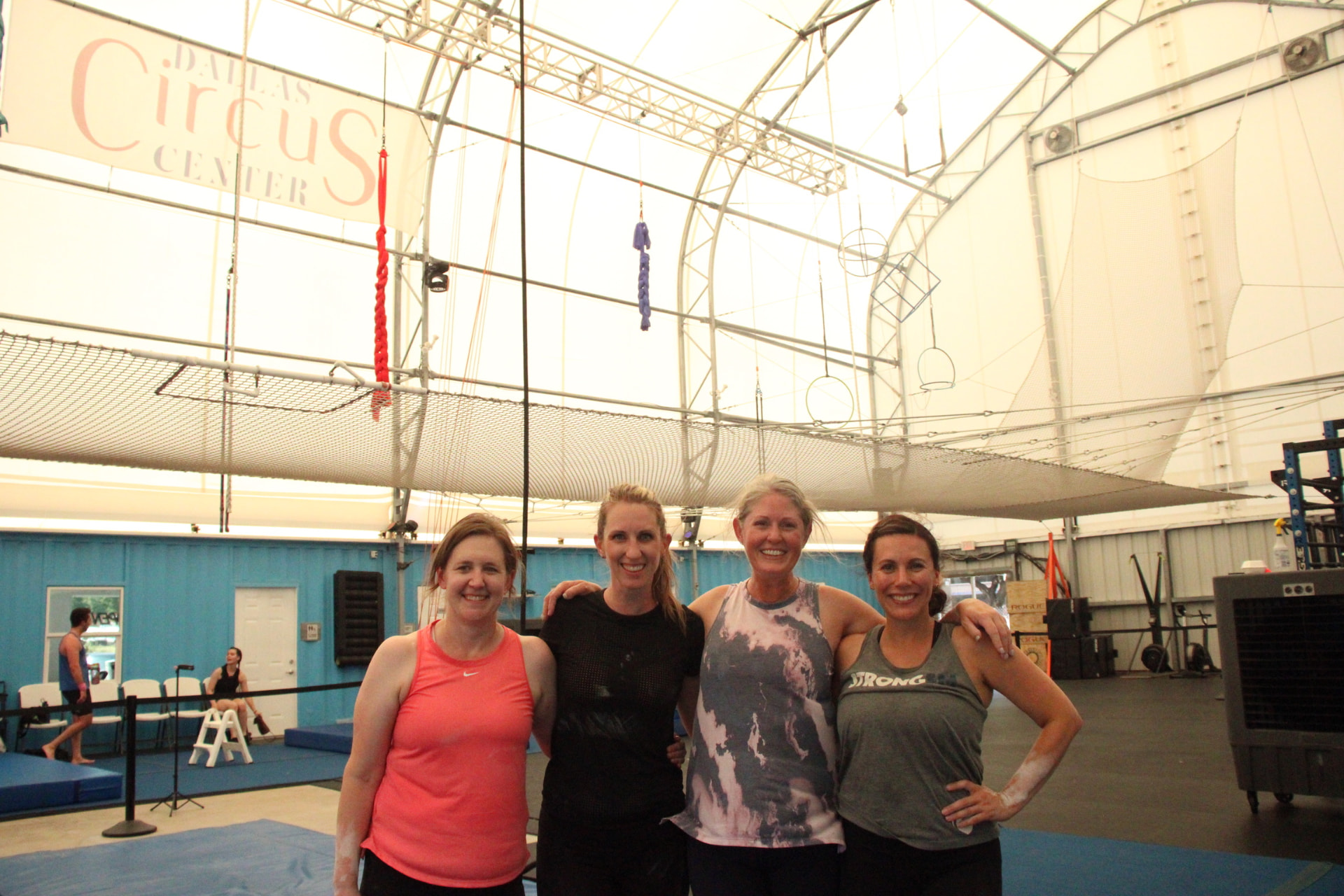 Group of students together in the training space at Dallas Circus Center